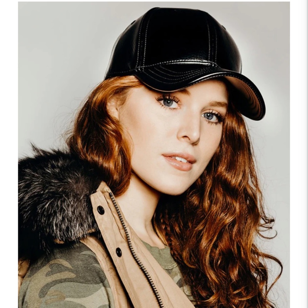 Vegan leather black baseball cap with satin lining and elastic back